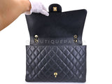 Chanel Black Caviar Maxi Classic Double Flap Bag GHW DSV