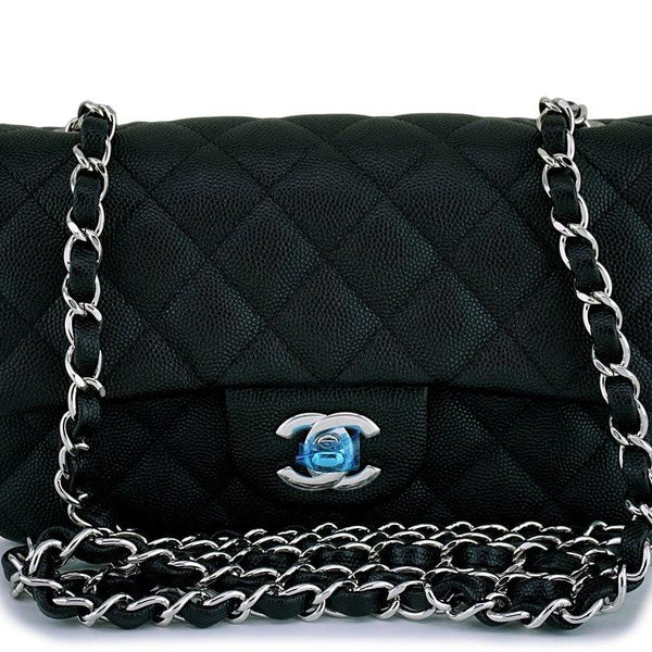 Timeless Chanel extra mini classic flap bag in black caviar