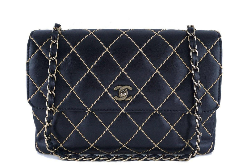 Chanel Black Contrast Stitch Surpique Jumbo Classic Flap Bag – Boutique  Patina