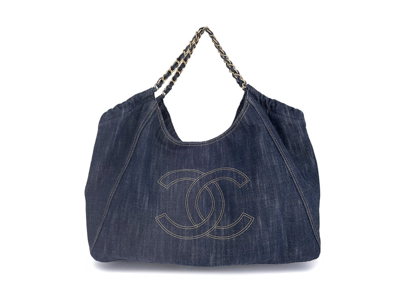 Step out in style with the iconic 2007 Chanel XL Denim Coco Cabas Tote
