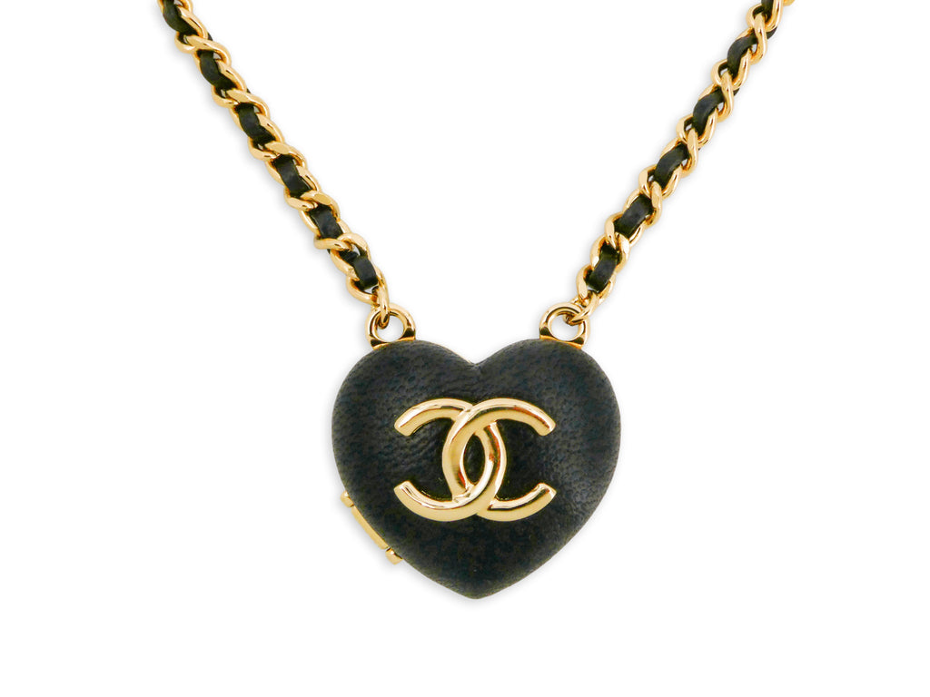chanel bag with heart chain necklace